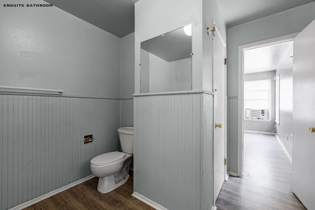 bathroom featuring toilet and hardwood / wood-style floors