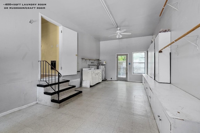 foyer featuring ceiling fan and electric water heater