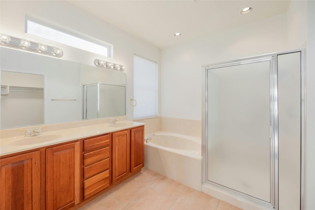 bathroom featuring vanity, separate shower and tub, and tile patterned floors