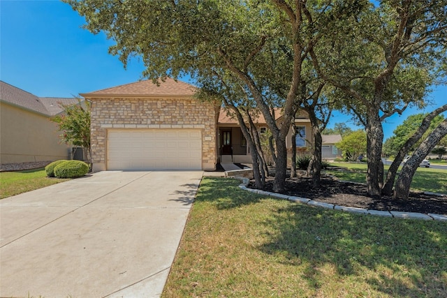 ranch-style house with a garage and a front yard