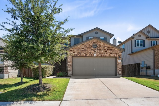 view of front facade with a front lawn and a garage