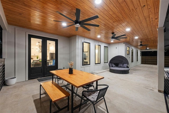 dining area featuring wooden ceiling and ceiling fan