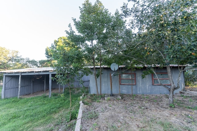 exterior space featuring a carport