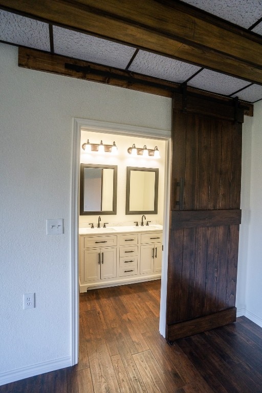 bathroom featuring hardwood / wood-style floors and vanity