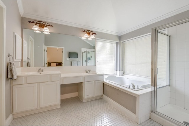 bathroom featuring lofted ceiling, shower with separate bathtub, vanity, and crown molding