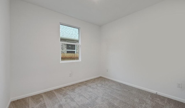 unfurnished room with carpet floors