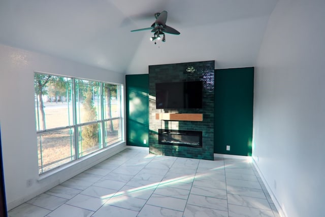 living room featuring lofted ceiling and ceiling fan