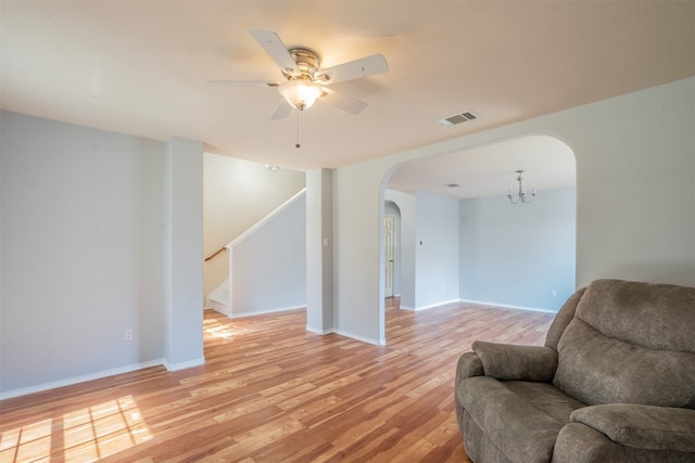 sitting room featuring ceiling fan and light hardwood / wood-style floors