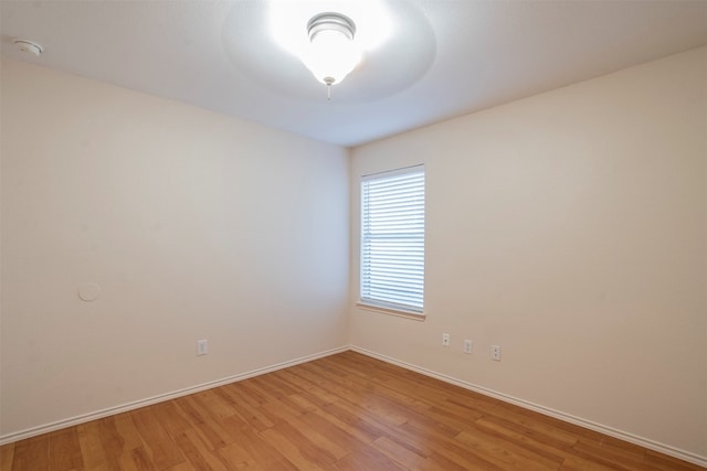 unfurnished room featuring light wood-type flooring