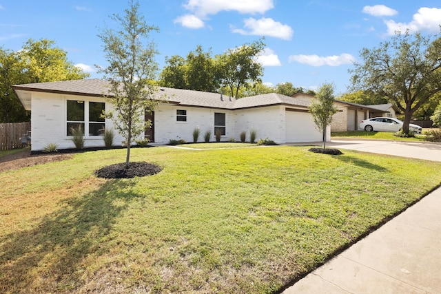 ranch-style house featuring a front lawn