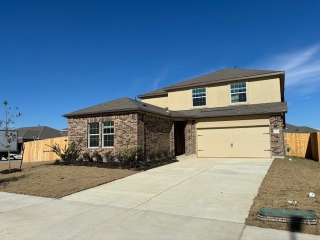 view of front of home with a garage