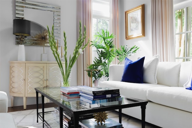 interior space with light parquet flooring and a healthy amount of sunlight