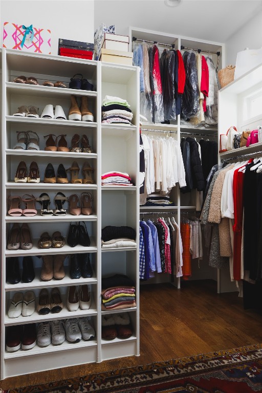 walk in closet featuring hardwood / wood-style floors