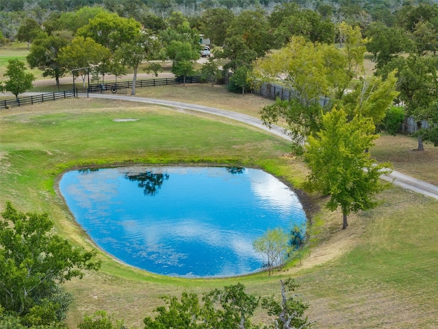 bird's eye view with a water view and a rural view