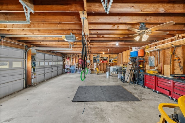 garage featuring a garage door opener and ceiling fan