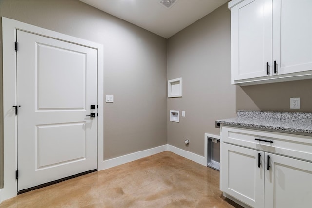 laundry room featuring hookup for a washing machine, hookup for an electric dryer, and cabinets