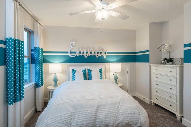 bedroom featuring dark carpet and ceiling fan