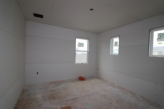 unfurnished room with plenty of natural light