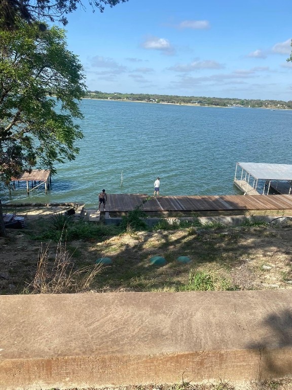 dock area featuring a water view