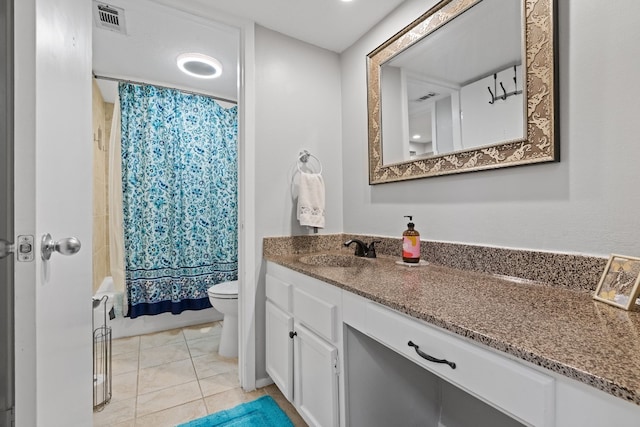 full bathroom featuring shower / tub combo, tile patterned floors, vanity, and toilet