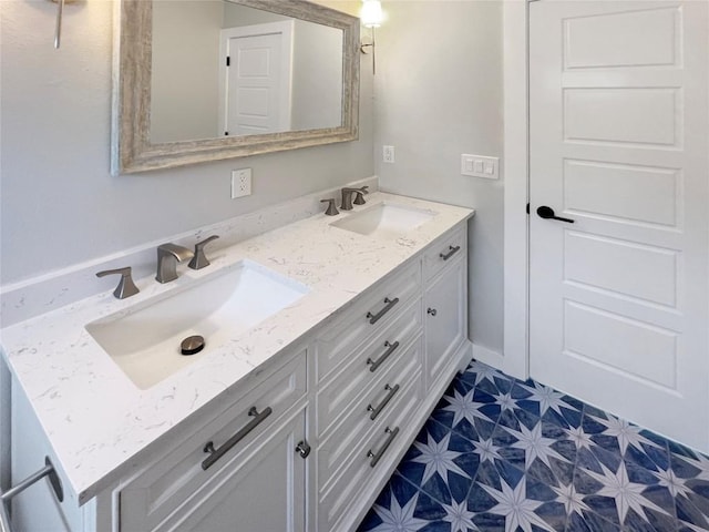 9614 Newfoundland Cir, Austin, TX 78758 - bathroom with double vanity and tile patterned floors