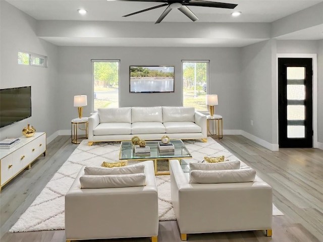 9614 Newfoundland Cir, Austin, TX 78758 - living room featuring ceiling fan, plenty of natural light, wood finished floors, and recessed lighting