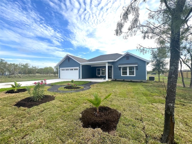 single story home featuring a front lawn and a garage