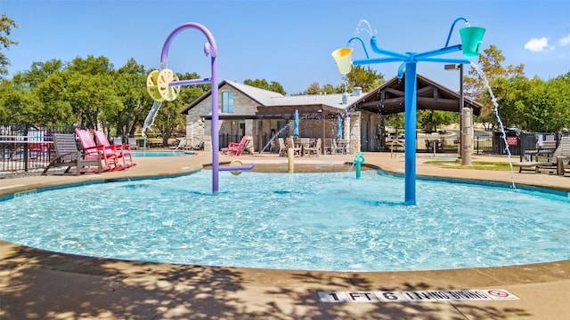 view of play area with a community pool