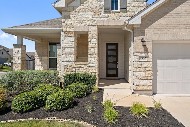 entrance to property with a garage