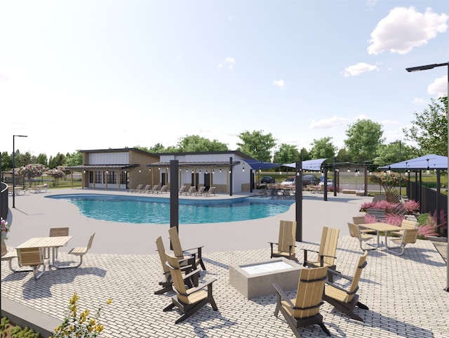 view of swimming pool with a pergola, a patio, and a fire pit