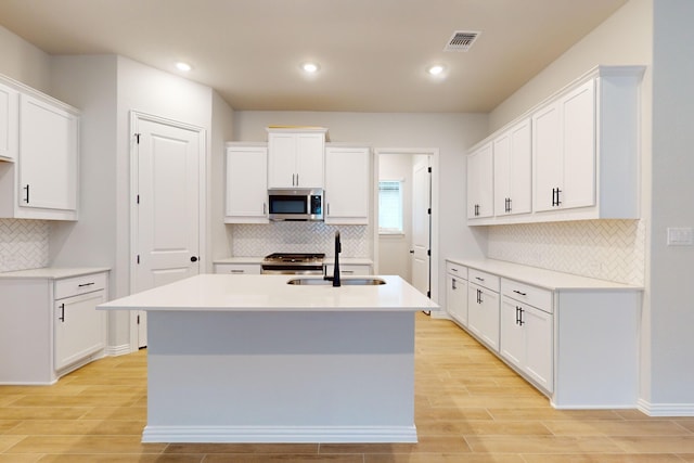 kitchen with sink and white cabinets