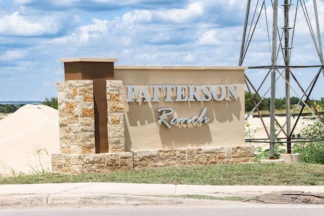 view of community sign