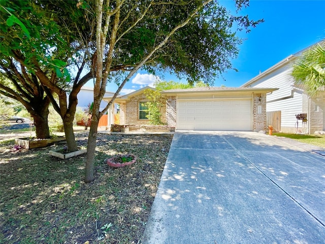 single story home featuring a garage