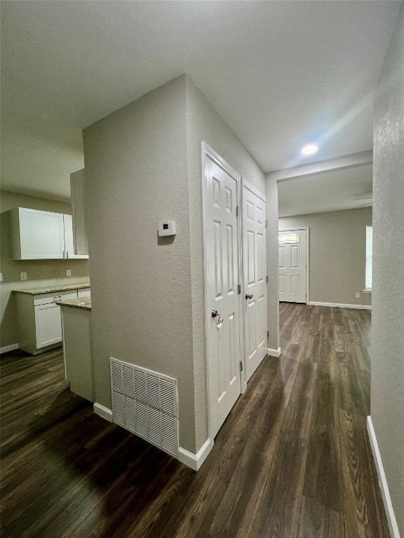 hall featuring dark hardwood / wood-style floors