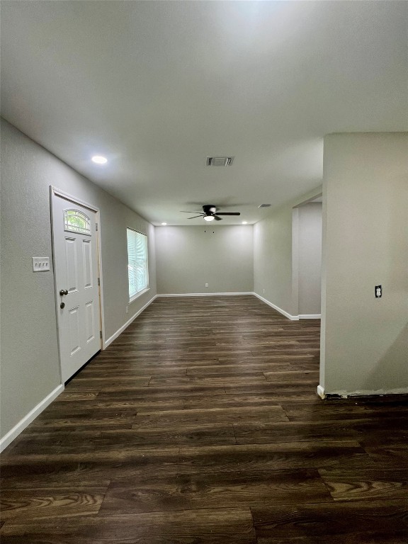 interior space with dark hardwood / wood-style flooring