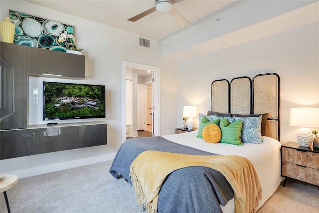 bedroom featuring visible vents, carpet floors, and ceiling fan