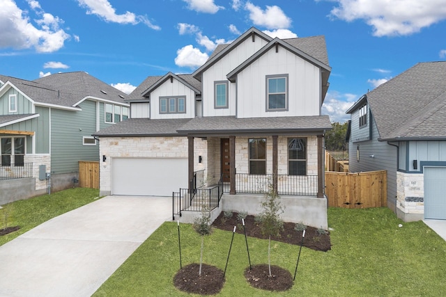 craftsman house with a front yard and a porch