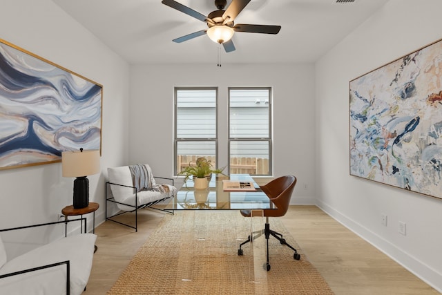 office area featuring ceiling fan and light wood-type flooring