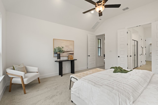 bedroom featuring lofted ceiling, light carpet, and ceiling fan