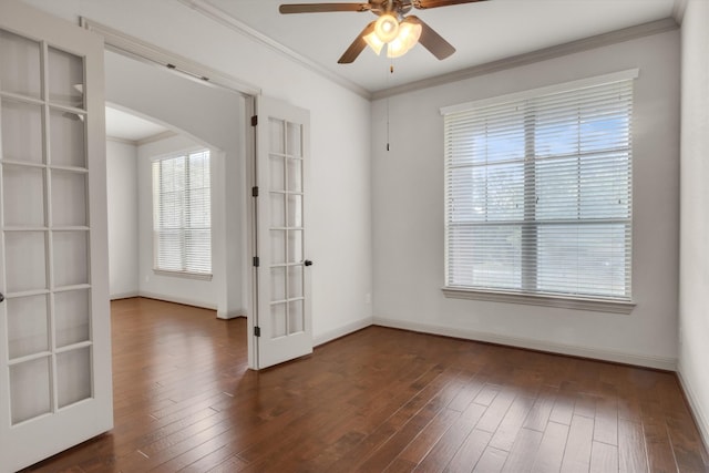 unfurnished room with ceiling fan, crown molding, and dark hardwood / wood-style flooring