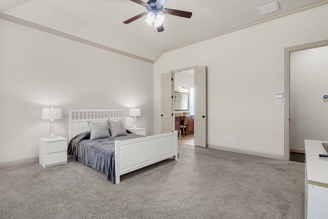 bedroom with vaulted ceiling, connected bathroom, ceiling fan, ornamental molding, and light carpet