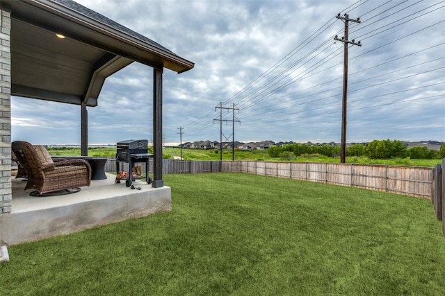 view of yard with a patio area