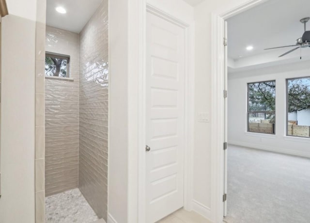 bathroom with light colored carpet