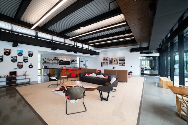 living room with concrete flooring