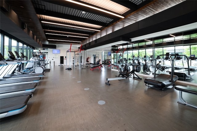 workout area featuring hardwood / wood-style floors