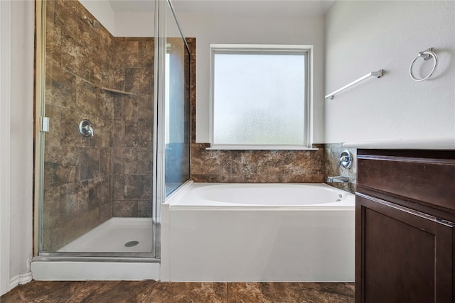 bathroom with vanity and plus walk in shower