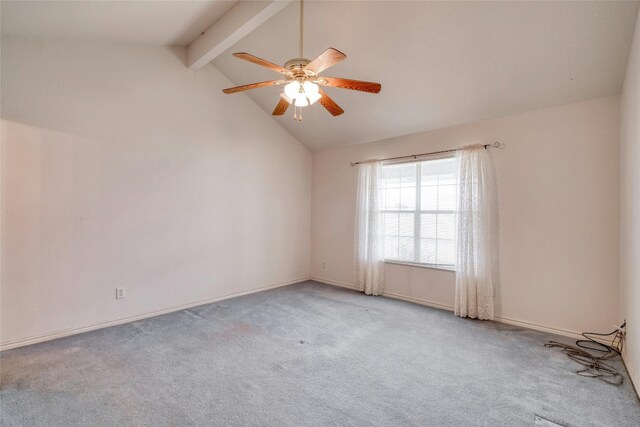 carpeted spare room featuring lofted ceiling with beams and ceiling fan