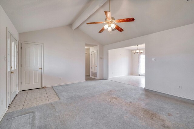 interior space featuring vaulted ceiling with beams, ceiling fan with notable chandelier, and light carpet