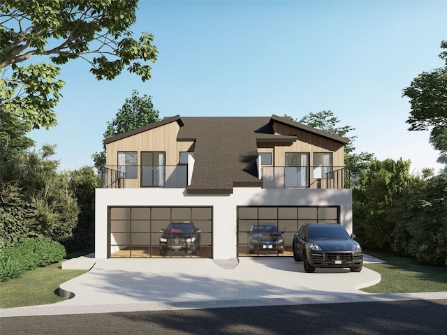 contemporary house featuring a balcony and a garage