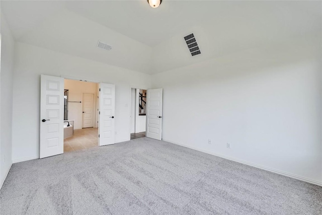 unfurnished bedroom with light carpet